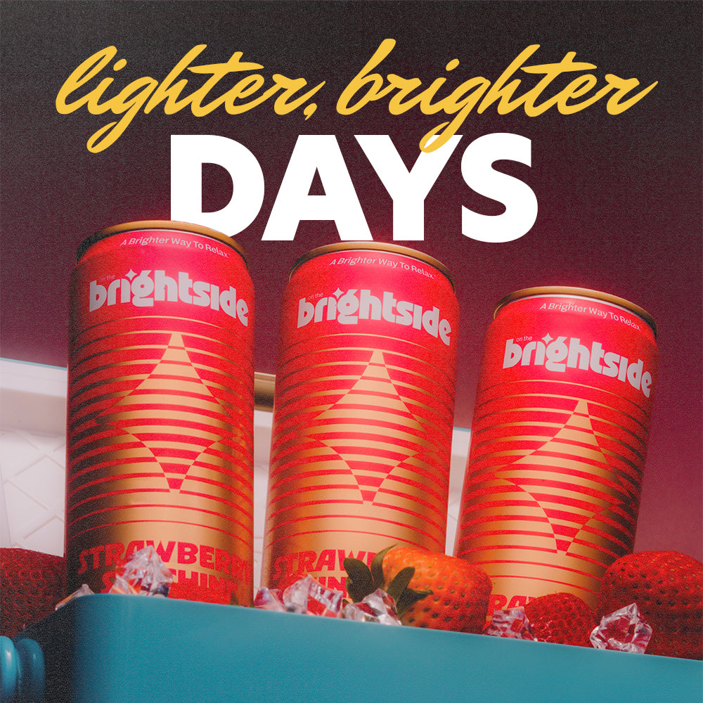 Three strawberry sunshine Brightside soda cans arranged in a turquoise cooler with strawberries, under large text reading 'lighter, brighter DAYS' on a maroon background.