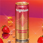 Can of Brightside Strawberry Sunshine drink on a reflective surface with strawberries and pink and purple background